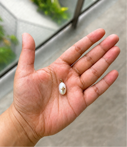 Pearl Power teardrop pearl pendant with handmade metal detail